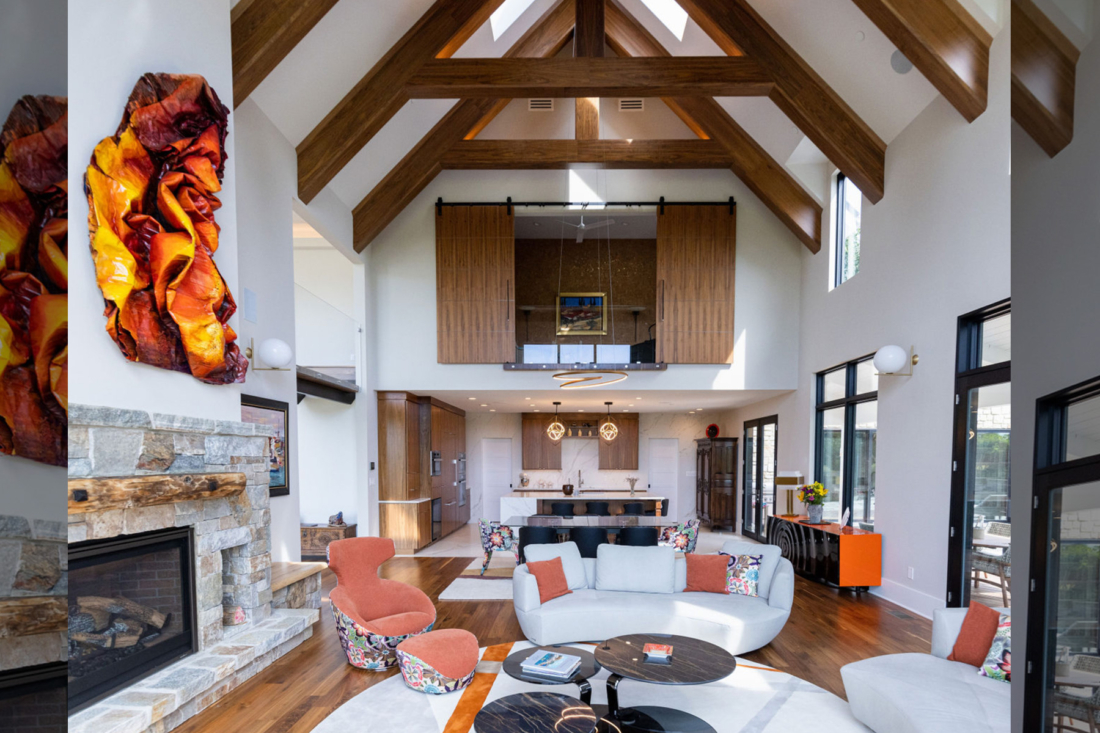 grand-open-plan-living-dining-kitchen-farmhouse-modern-peaked-ceiling-1100x733.jpg