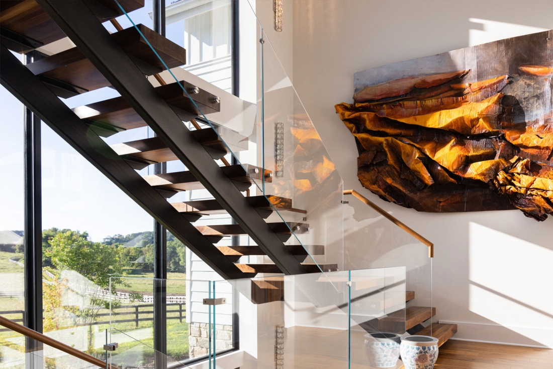 modern-floating-staircase-glass-panels-wood-treads-wall-windows-1100x733.jpg