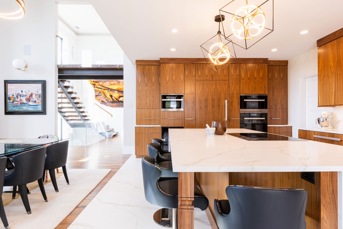 modern-kitchen-open-to-living-room-marble-center-island-1100x733.jpg
