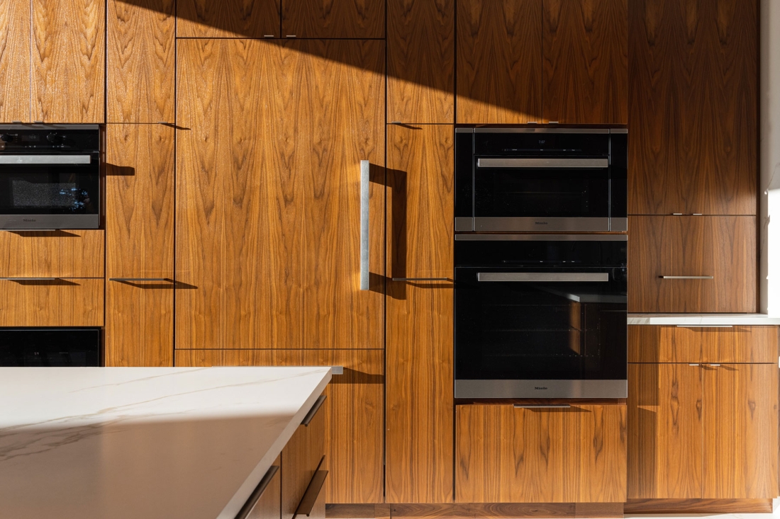 wall-of-cabinets-appliance-cabinet-front-pantry-premium-wood-finish-1100x733.jpg