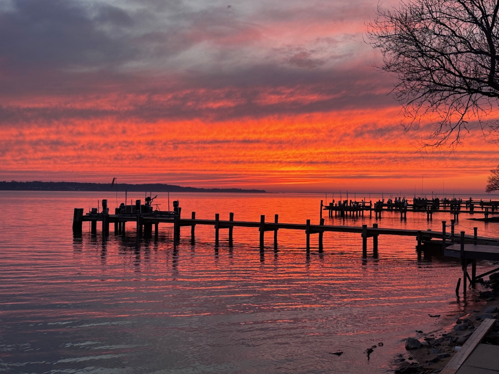 Sunset view of the docks with glorious reds, pinks, and purples